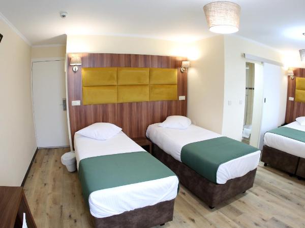 Sun Hotel : photo 1 de la chambre chambre quadruple confort