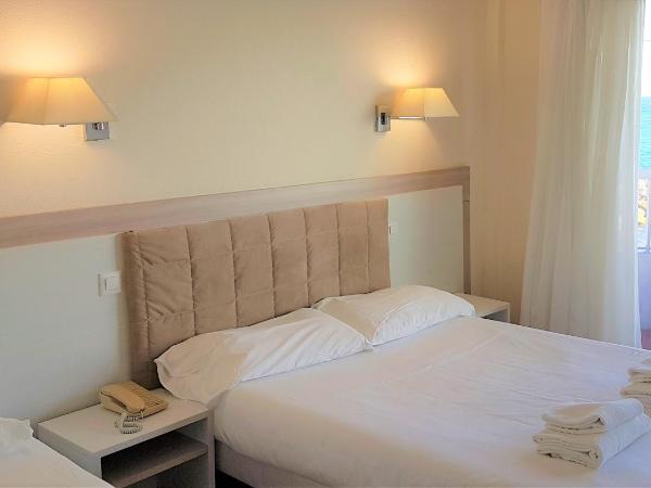 Hôtel Le Dauphin : photo 7 de la chambre chambre double ou lits jumeaux avec balcon - vue sur mer