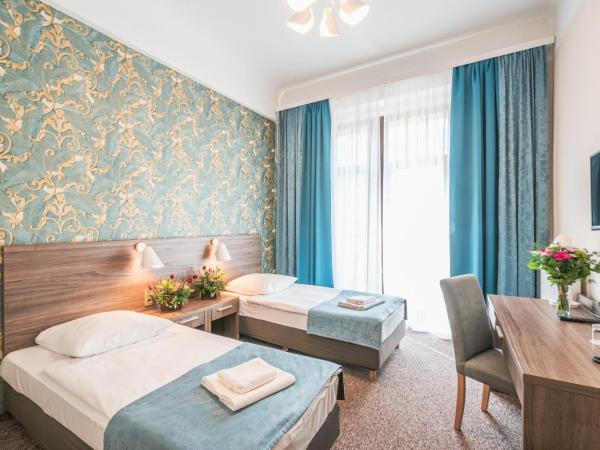 Hotel Polonia Centrum : photo 2 de la chambre chambre lits jumeaux supérieure