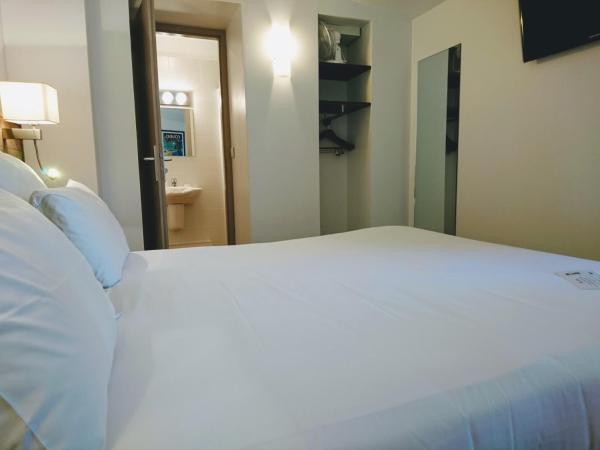 Accostage Hôtel Plage de la Concurrence : photo 3 de la chambre chambre double ou lits jumeaux avec patio