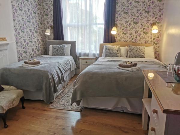 Adams Guest House : photo 1 de la chambre chambre familiale (3 adultes)