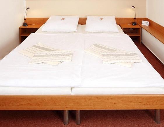 Penzion pivovarská restaurace Moravia : photo 1 de la chambre chambre quadruple