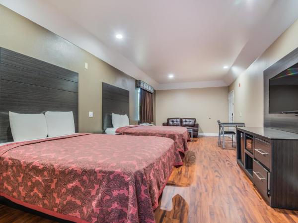 Scottish Inns & Suites IAH Airport-Beltway 8 : photo 2 de la chambre chambre avec 2 grands lits queen-size