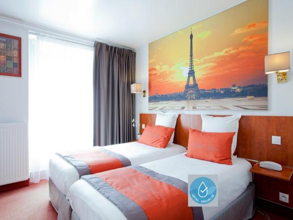 Alyss Saphir Cambronne Eiffel : photo 7 de la chambre chambre lits jumeaux