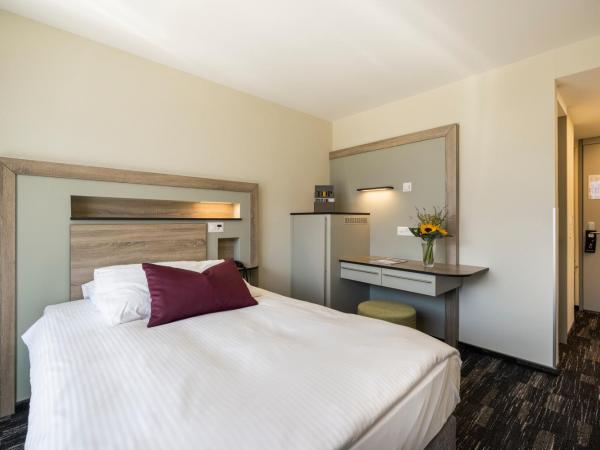 Metropole Swiss Quality Hotel : photo 4 de la chambre chambre simple deluxe