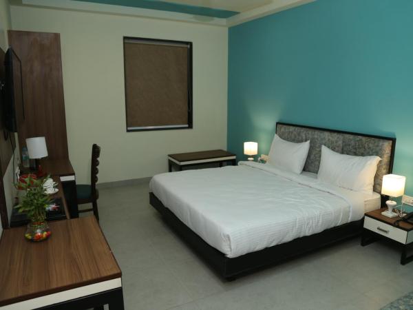 Vijay Vilas Hotel & Convention Hall : photo 2 de la chambre chambre deluxe double ou lits jumeaux