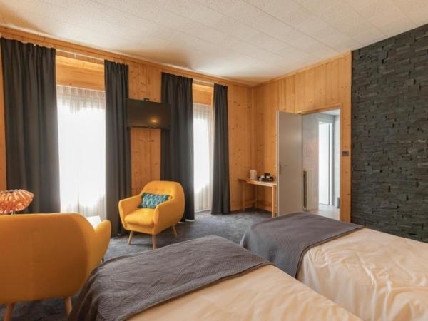 Hôtel Astérides Sacca : photo 6 de la chambre hébergement lits jumeaux esprit chalet - vue sur patrimoine