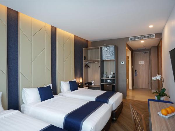 Aston Kemayoran City Hotel : photo 4 de la chambre chambre triple deluxe