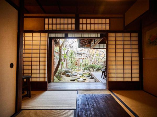 Guest House Koiya : photo 1 de la chambre chambre lits jumeux de style japonais avec jardin - rez-de-chaussée