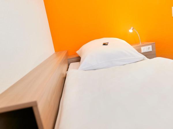 Townhouse Düsseldorf : photo 3 de la chambre chambre simple standard