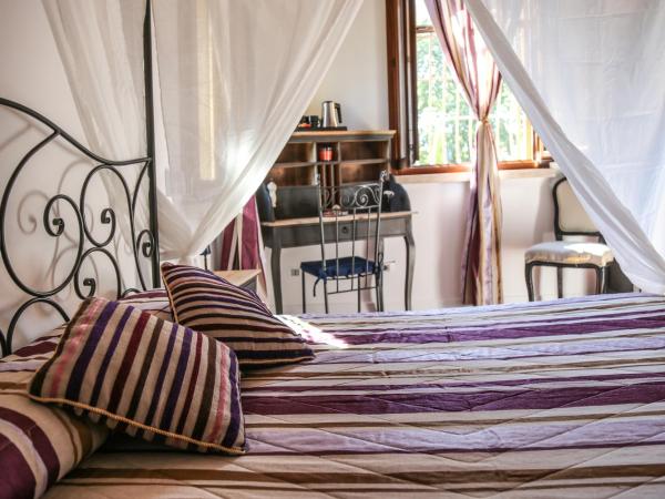 La Puraza Comfort Rooms : photo 1 de la chambre chambre lit king-size standard