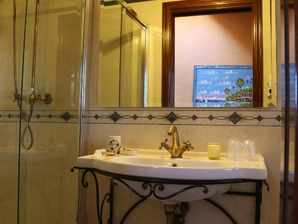 La Puraza Comfort Rooms : photo 3 de la chambre chambre lit queen-size - vue sur jardin