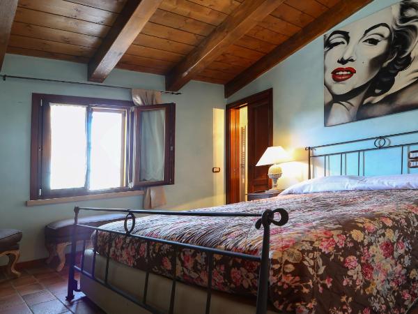 La Puraza Comfort Rooms : photo 7 de la chambre chambre lit queen-size - vue sur jardin