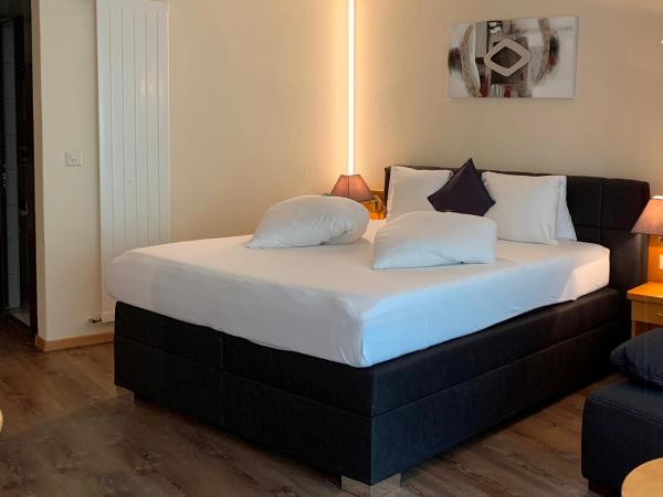 Hotel Quellenhof Leukerbad : photo 1 de la chambre chambre double
