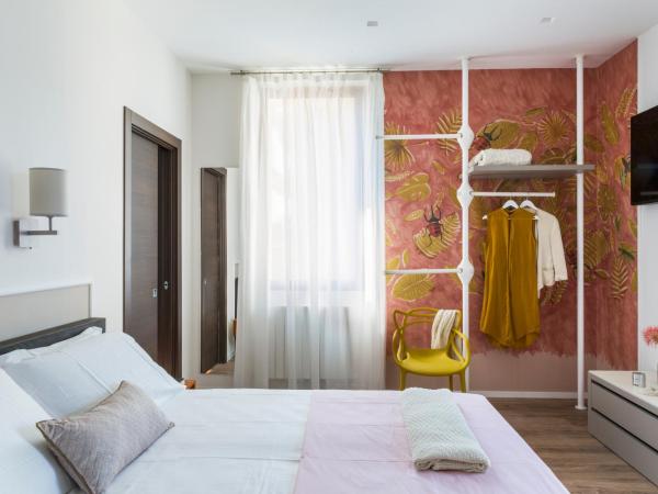 San Leonardo Suites : photo 1 de la chambre chambre double deluxe avec balcon