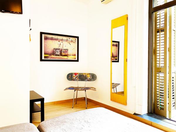 Hostal Portugal : photo 4 de la chambre chambre lits jumeaux