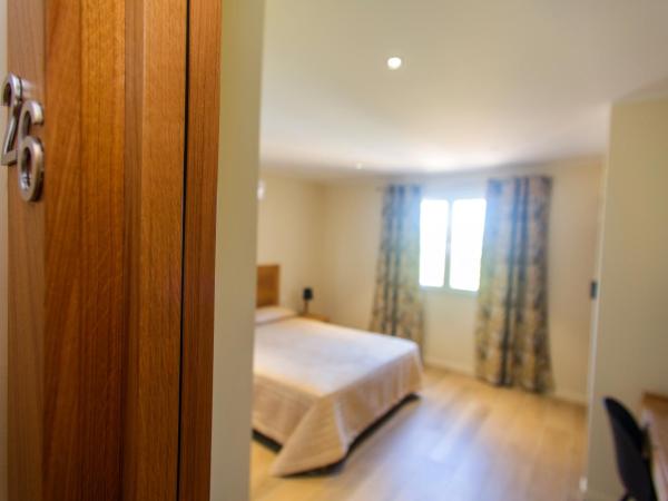 Hotel Cesario : photo 5 de la chambre chambre double confort - vue sur montagne ou jardin