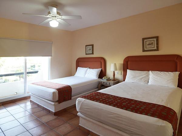 Suites Las Palmas : photo 4 de la chambre chambre double avec 2 lits queen-size