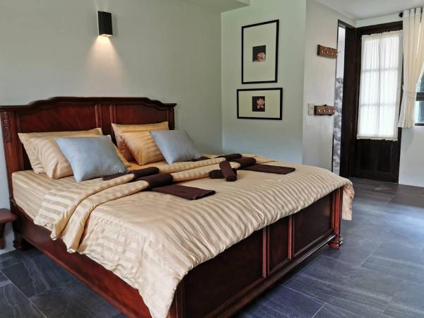Palin Family Cottage : photo 2 de la chambre chambre deluxe double ou lits jumeaux