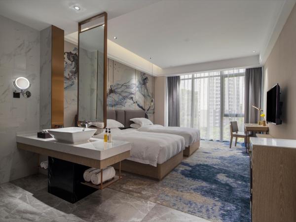 Paco Hotel Jinfeng Metro Guangzhou - Free Shuttle Bus For Canton Fair : photo 9 de la chambre chambre lits jumeaux deluxe