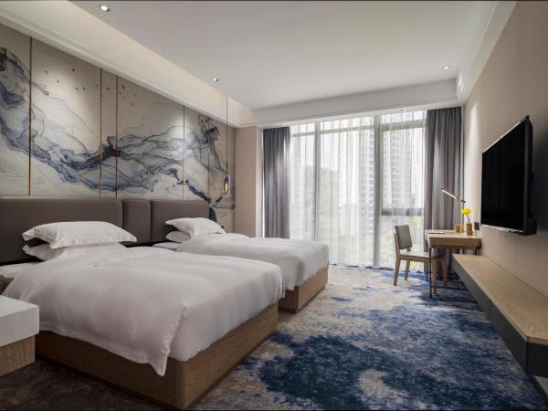 Paco Hotel Jinfeng Metro Guangzhou - Free Shuttle Bus For Canton Fair : photo 8 de la chambre chambre lits jumeaux deluxe
