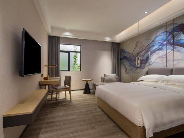 Paco Hotel Jinfeng Metro Guangzhou - Free Shuttle Bus For Canton Fair : photo 4 de la chambre chambre simple