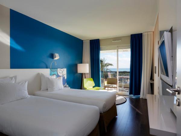 Hotel Napoléon : photo 1 de la chambre chambre lits jumeaux avec balcon - vue sur mer
