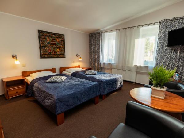 Villa Toscania-check in 24h : photo 2 de la chambre chambre lits jumeaux avec douche 