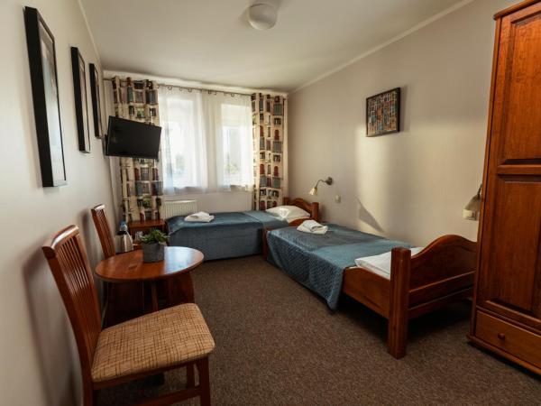 Villa Toscania-check in 24h : photo 2 de la chambre chambre lits jumeaux