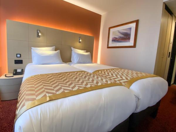 Nash Airport Hotel : photo 1 de la chambre chambre lits jumeaux