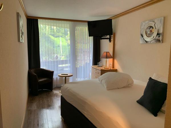 Hotel Quellenhof Leukerbad : photo 1 de la chambre chambre simple