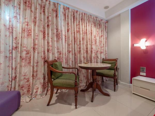 Access Inn Pattaya : photo 4 de la chambre suite