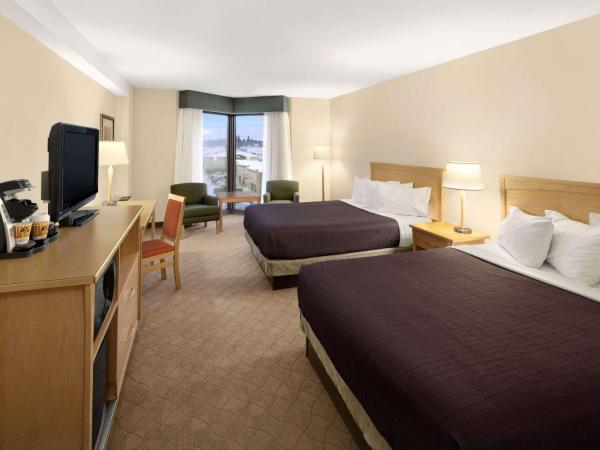 Travelodge Hotel by Wyndham Saskatoon : photo 4 de la chambre chambre lit queen-size standard - section tour hébergement non-fumeurs 