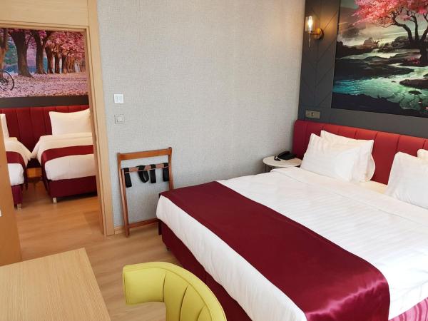 MY GARDEN SUITES : photo 2 de la chambre suite familiale