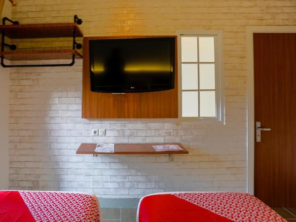 SUPER OYO 3109 Point Inn : photo 7 de la chambre chambre lits jumeaux standard