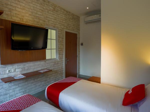 SUPER OYO 3109 Point Inn : photo 8 de la chambre chambre lits jumeaux standard