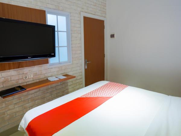 SUPER OYO 3109 Point Inn : photo 4 de la chambre chambre double standard