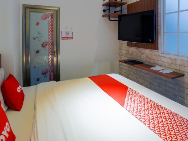 SUPER OYO 3109 Point Inn : photo 5 de la chambre chambre double standard