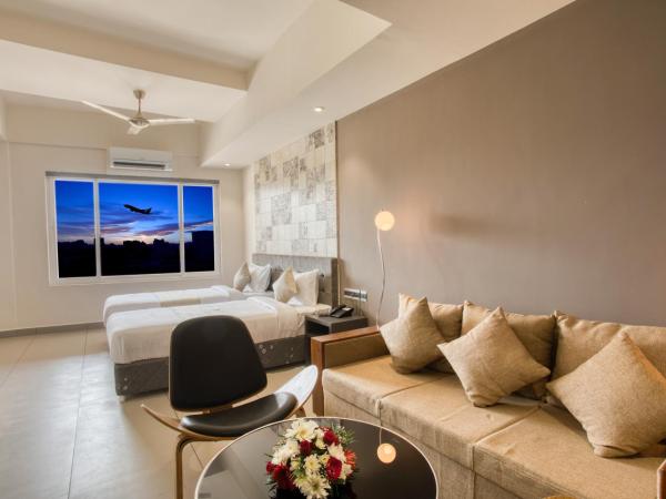 AS AIRPORT Inn : photo 3 de la chambre suite