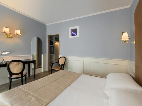 Hotel San Luca : photo 8 de la chambre chambre double avec lit d'appoint (3 adultes)