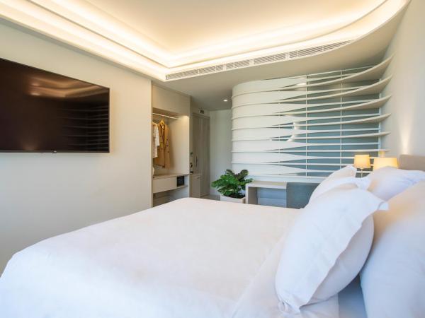 Green Suites Boutique Hotel : photo 4 de la chambre chambre premium king ou lits jumeaux