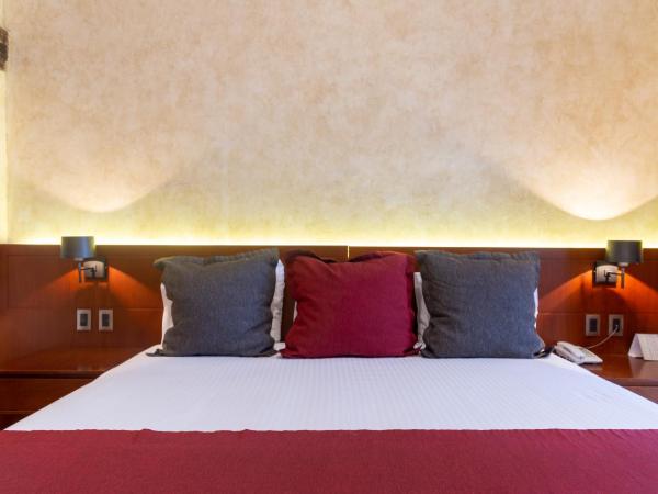 Hotel Madero : photo 7 de la chambre chambre lit king-size deluxe