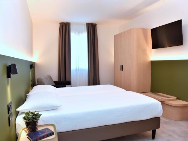 Hotel Casa Del Pellegrino : photo 6 de la chambre chambre triple confort avec vue