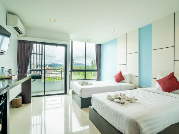 CA Hotel and Residence Phuket - SHA Extra Plus : photo 3 de la chambre chambre lits jumeaux deluxe