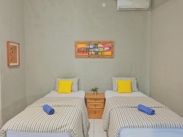 Manggolo Homestay Syariah : photo 5 de la chambre chambre familiale