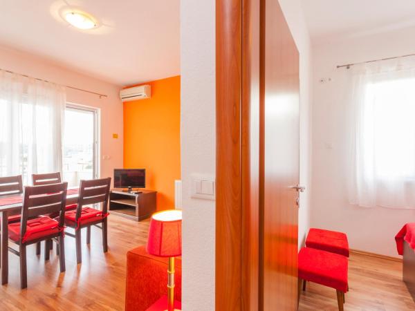 Apartments & Rooms Alagić : photo 3 de la chambre appartement avec balcon