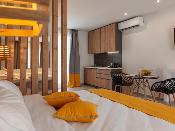 STAY INN : photo 2 de la chambre suite avec baignoire d’hydromassage