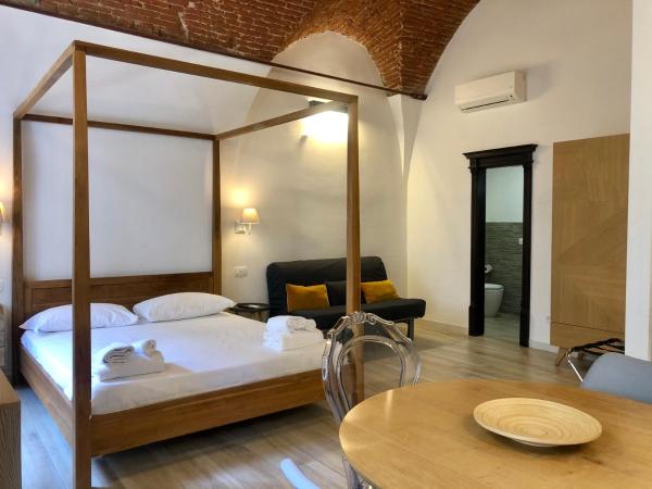 Dimora Cavalieri : photo 2 de la chambre chambre double deluxe (2 adultes + 1 enfant)