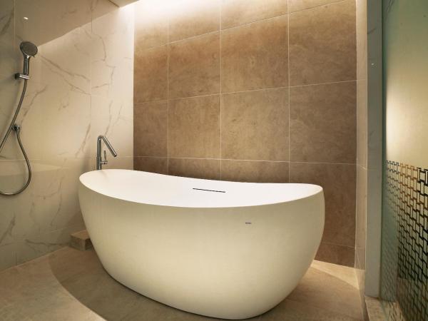 Harris Suites Puri Mansion : photo 3 de la chambre suite 1 chambre