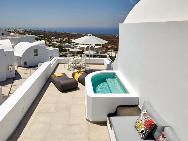 Aperanto Suites : photo 1 de la chambre villa principale avec jacuzzi extérieur chauffé